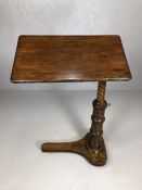 Antique mahogany reading table with adjustable height and tilt mechanism on turned stand with makers