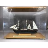 Scale model ship in case: 'The Discovery', from Captain Scott's first Antarctic Exhibition, ship