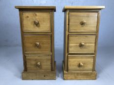 Pair of three drawer pine bedside cabinets, approx 32cm x 28cm x 66cm tall