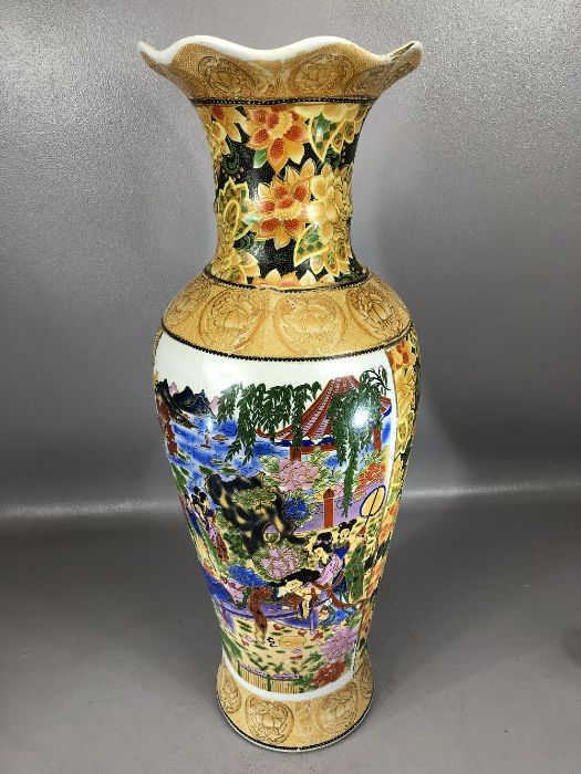 Large Chinese baluster shaped yellow ground vase with panels depicting flowers and figures, approx