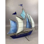 Decorative model of a sailing yacht with Tiffany style glass panels to the sails and hull, approx