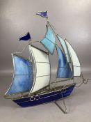 Decorative model of a sailing yacht with Tiffany style glass panels to the sails and hull, approx
