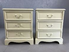 Pair of white painted three drawer bedside cabinets
