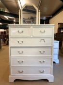 White painted pine chest of six drawers with similar mirror
