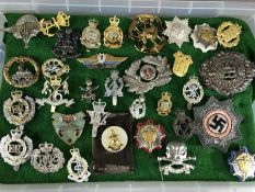 Military interest: Collection of cap badges and insignia, circa 33