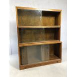 Mid Century modular three piece glass fronted bookcase, of waterfall design, approx 89cm x 29cm x