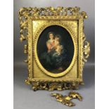 Oil painting of a Madonna and child in oval gilt frame, inscription verso partly indistinct but