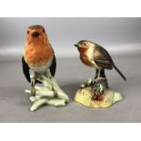 Two ceramic Robins, the first by Royal Crown Derby approx 10cm in height, the second by Goebel
