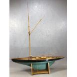 Large wooden sailing pond yacht on stand, approx 140cm x 174cm (A/F)