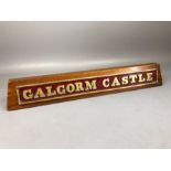 Brass train name plaque for the 'Galgorm Castle' mounted on wooden plinth, with presentation