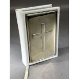 SIlver hallmarked fronted Bible with white leather covers and raised silver cross approx 8.5 x