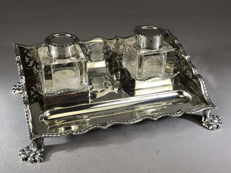 Silver hallmarked double Inkstand on four Lion paw feet with glass silver topped hinged lidded