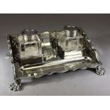 Silver hallmarked double Inkstand on four Lion paw feet with glass silver topped hinged lidded