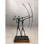 In the style of Giacometti: Contemporary bronze study of two archers raised on wooden plinth, approx