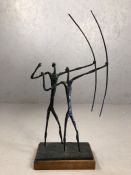 In the style of Giacometti: Contemporary bronze study of two archers raised on wooden plinth, approx