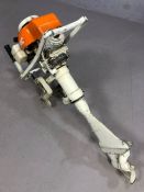 Vintage outboard motor by MAC in white and orange, untested