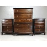 Stag chest of drawers and two Stag bedside tables, all with matching circular handles