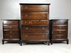 Stag chest of drawers and two Stag bedside tables, all with matching circular handles