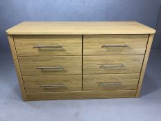 Modern chest of six drawers with chrome handles, approx 127cm x 47cm x 75cm tall
