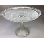 Glass tazza with frosted bowl etched with a Greek key pattern, raised on a circular frosted stem and