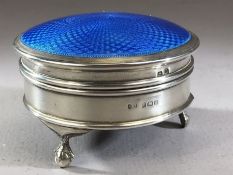 Silver hallmarked circular jewellery box on ball and claw feet with Blue enamel hinged lid