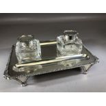 Silver Hallmarked desk set comprising silver Tray raised on tapering feet and with two Glass