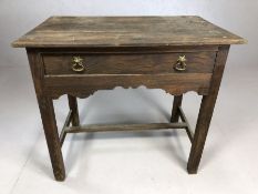 Stained pine occasional table with cross stretcher and single drawer, approx 82cm x 51cm x 72cm