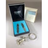 Hallmarked Silver pair of boxed collar Stiffeners and a silver coloured key chain F1 car
