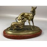 Bronze depicting a Greyhound and King Charles Spaniel signed P J Mene, on a stepped bronze base