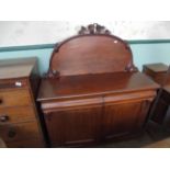 Victorian mahogany chiffonier, the over mantle with carved sprays of grapes,