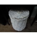 Circular white painted lidded linen basket