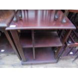 Low mahogany nest of book display shelves