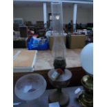 Early 20th century oil lamp with glass flue and non-fitting etched clouded glass shade