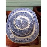 2 large willow patterned meat chargers and 3 decorative blue and white meat plates