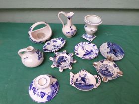 Sel. of miniature blue and white Delft items incl. ashtrays, small plates, candleholders etc.