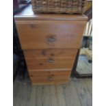 Modern nest of 3 storage drawers each with brass handles