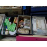 3 small boxes of needlework accessories incl. tapes, embroidered fringes, ribbons etc.