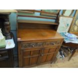Mid 20th century oak sideboard with upper display gallery,
