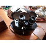 As new pair of Zoom binoculars in black leather carrying case
