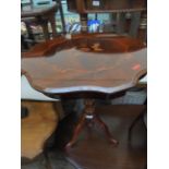 Inlaid mahogany circular topped side table on tricorn base