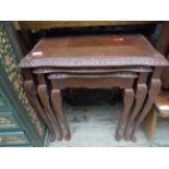 Nest of 3 graduated carved coffee tables each with glass top