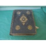 Browns leather and brass bound Bible with many coloured illustrations
