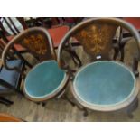 Most unusual pair of hoop backed occasional chairs,