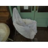 Delightful Edwardian iron framed swinging child's cot with original lining and linen