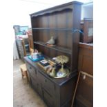 Dark oak kitchen dresser, the upper panel back fitted two display shelves,