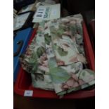 Box of multi-coloured floral patterned curtain material