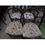 Pair of delicate inlaid oval backed bedroom chairs on tapering turned feet,