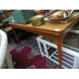 Modern grained formica topped draw leaf extending dining table on plain tapering legs