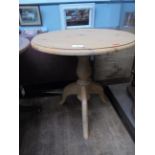 Polished pine circular topped occasional table on tricorn base