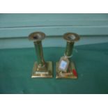 Pair of Georgian brass candlesticks